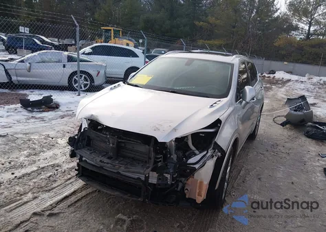 2017 Buick Envision Essence z USA, uszkodzony, nr VIN LRBFXBSA8HD116380